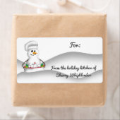 De chef-kok dienende sneeuwballen van de sneeuwman etiket (Insitu)