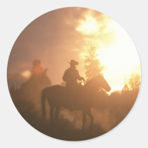 De Cowboy van de zonsondergang Ronde Sticker