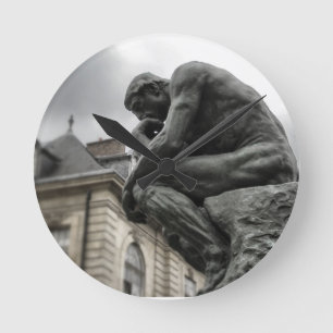 De culptuur van Thinker Rodin Paris Ronde Klok