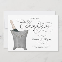 De datum van het huwelijk uitstellen, champagne va aankondiging