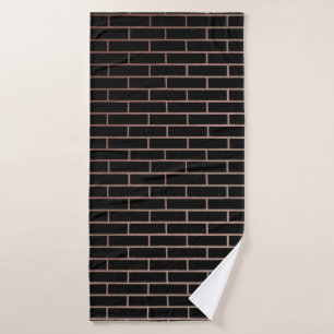 De donkere zwarte muur heeft een ruw oppervlak als badhanddoek