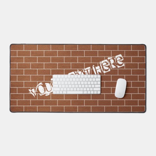 De Douanetekst van het baksteenmuur Ontwerp Bureaumat (Keyboard & Muis)