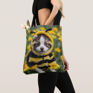 De drukste pup in de weide tote bag