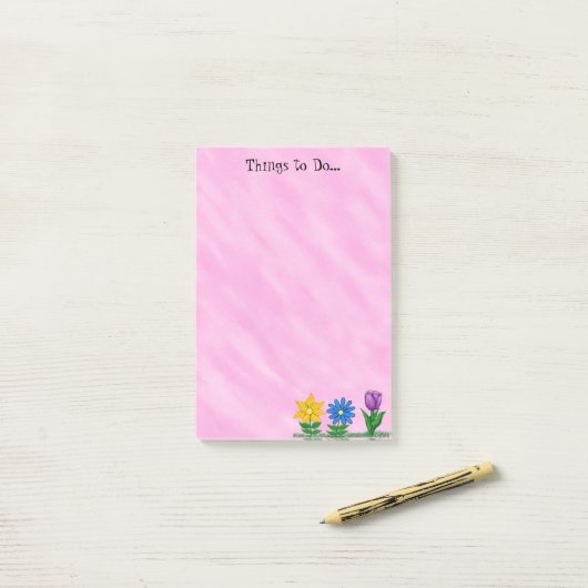 De druppels van de tuin plaatsen de dingen roze he post-it® notes (Op bureau)