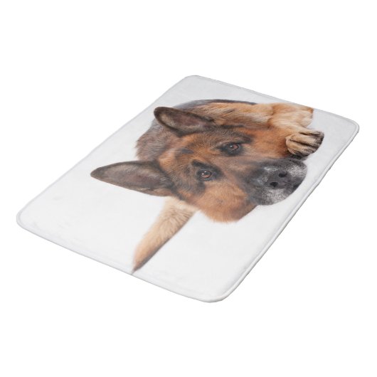 De Duitse herder ligt op een witte achtergrond Badmat (Gekanteld)