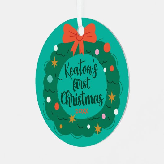 De eerste kerstdag van de baby met een persoonlijk metalen ornament (Voorkant links)