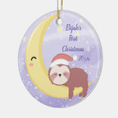 De eerste kerstmis van de baby met een gleuf en ee keramisch ornament (Links)