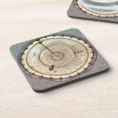 De eerste lentegedreven klok met druk, uitzicht va drankjes onderzetter (Linkerzijde)