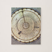 De eerste lentegedreven klok met druk, uitzicht va legpuzzel (Verticaal)