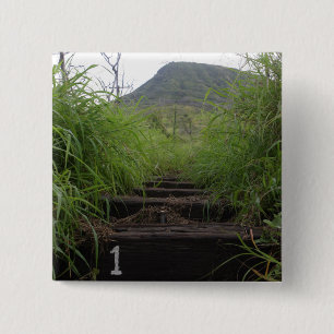 De eerste stap nodigt de fietsers uit op de Koko-k Vierkante Button 5,1 Cm