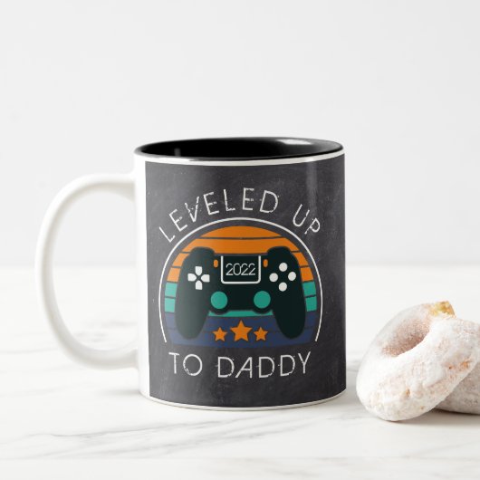 De eerste Vaderdag gamer van de papa. Tweekleurige Koffiemok (Met donut)
