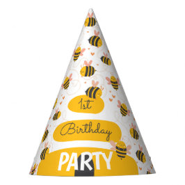 De eerste verjaardag van de bijengeel en roze baby feesthoedjes