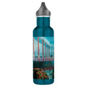 De flesje van het vliegende bad met water waterfles  (Links)