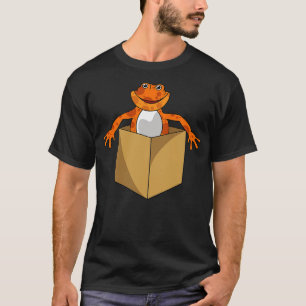 De gekke kikker kijkt uit een doos t-shirt