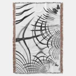 De gekruiste grijze lijnen herinneren ons aan teke deken