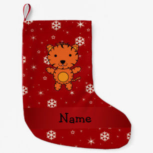De gepersonaliseerde rode sneeuwvlokken van de kleine kerstsok