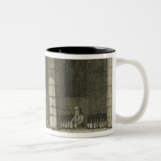 De glazen flessenmaker uit boekdelen II en Tr Tweekleurige Koffiemok (Rechts)