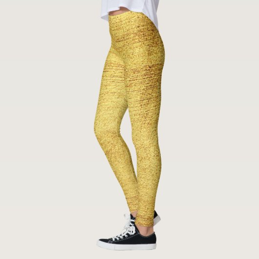 De gouden wereld van de moderne glimmende leggings (Links)