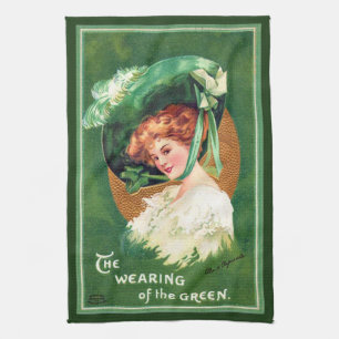 De groene keukenhanddoek dragen