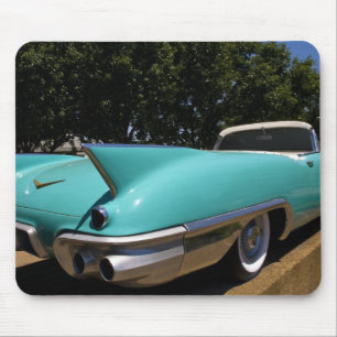 De groene ombouwbare Cadillac van Elvis Presley in Muismat