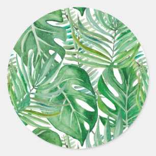 De grote bladeren van palmbomen en monstera ronde sticker