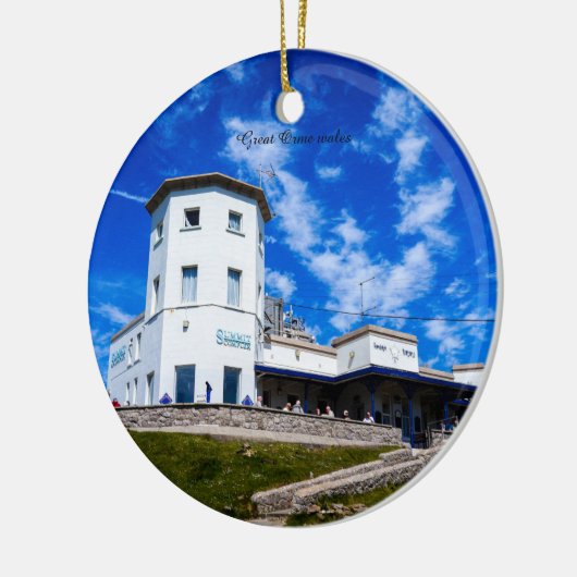 De grote Orme loopt. Keramisch Ornament (Links)