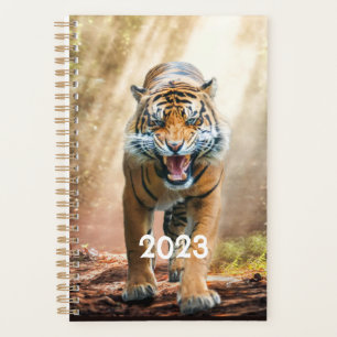 De Grotere Roaring in een Oerwoud met achtergrondv Planner