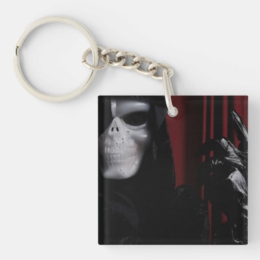 De handschoen- sleutelhanger (voorkant)