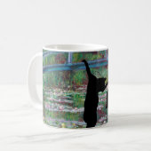De hangende zwarte kat en muis koffiemok (Voorkant links)
