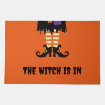 De heks zit in Halloween Deurmat