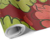 De herfst lekt op donkerrode achtergrond cadeaupapier (Rol Hoek)