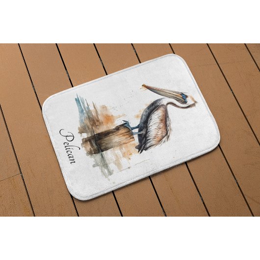 De houding van de pelikaan badmat