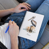 De houding van de pelikaan notitieboek