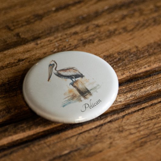 De houding van de pelikaan ronde button 3,2 cm