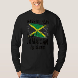 De Jamaicaan is hier Jamaica vlag Jamaicaanse wort T-shirt