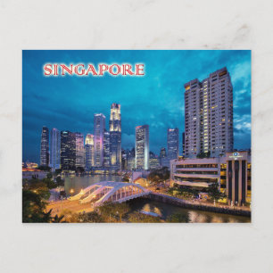 De kade en de skyline van Singapore 's nachts Briefkaart