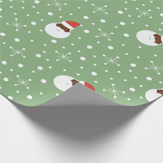 De kerstman? cadeaupapier (Hoek)