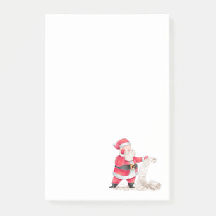 De kerstman controleert zijn lijst van Nice Post-it® Notes