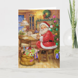 De Kerstman die aan zijn bureau werken Feestdagen Kaart