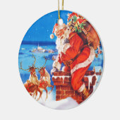 De kerstman en zijn rendier op de dak keramisch ornament (Links)