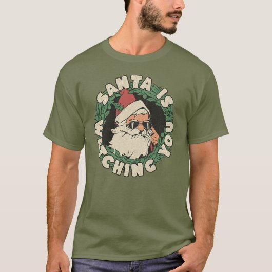 De Kerstman kijkt naar je grappige kerstvakantie T-shirt (Voorkant)