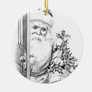De kerstman komt door de deur. keramisch ornament