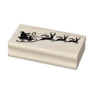 De kerstman met zijn slee en rendier rubberstempel