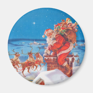 De kerstman op de dak met zijn rendiertje magneet