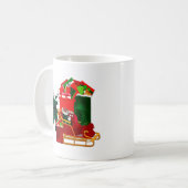 De kerstman pakt zijn slee koffiemok (Voorkant links)