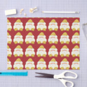 De kerstman pingelen in goud met rode poka-stippen tissuepapier (Craft)