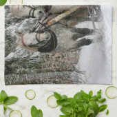 De kerstman rijdt in een paardje theedoek (Gevouwen)