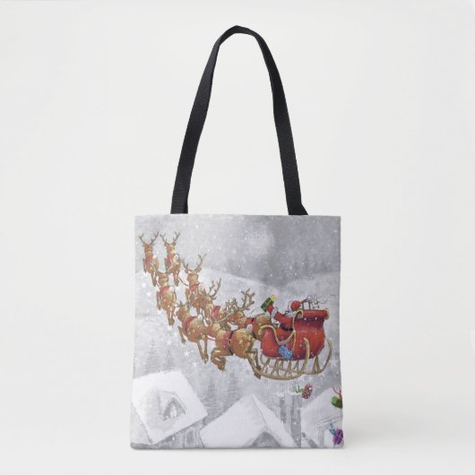 De kerstman rijdt op een slee met cadeaudoos tote bag (Voorkant)