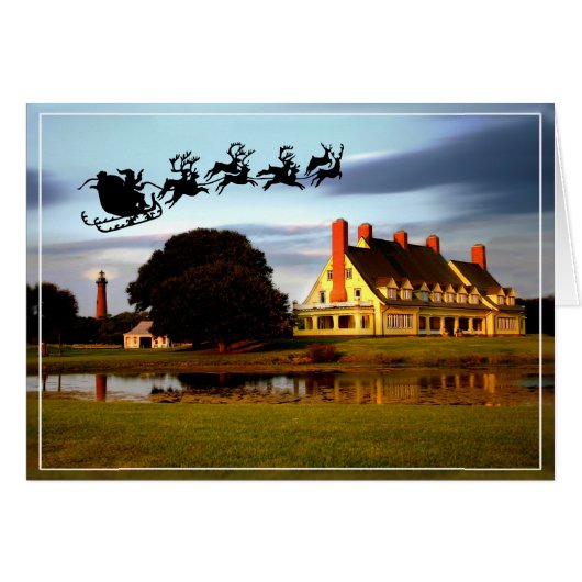 De Kerstman vliegt over de Whalehead Club en licht (Voorkant Horizontaal)