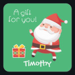 De Kerstman vraagt zich af: stout of mooi? vierkan Vierkante Sticker<br><div class="desc">De kleine kerstman heeft een cadeau voor iemand. Voeg een naam bij de bodem toe of verlaat leeg.</div>